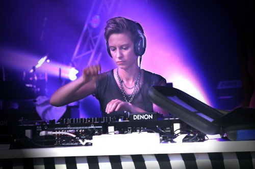Woman DJ playing turntable